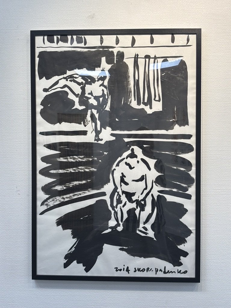 しゃがむ力士の墨画